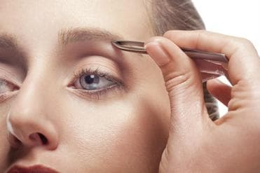 picking eyebrow