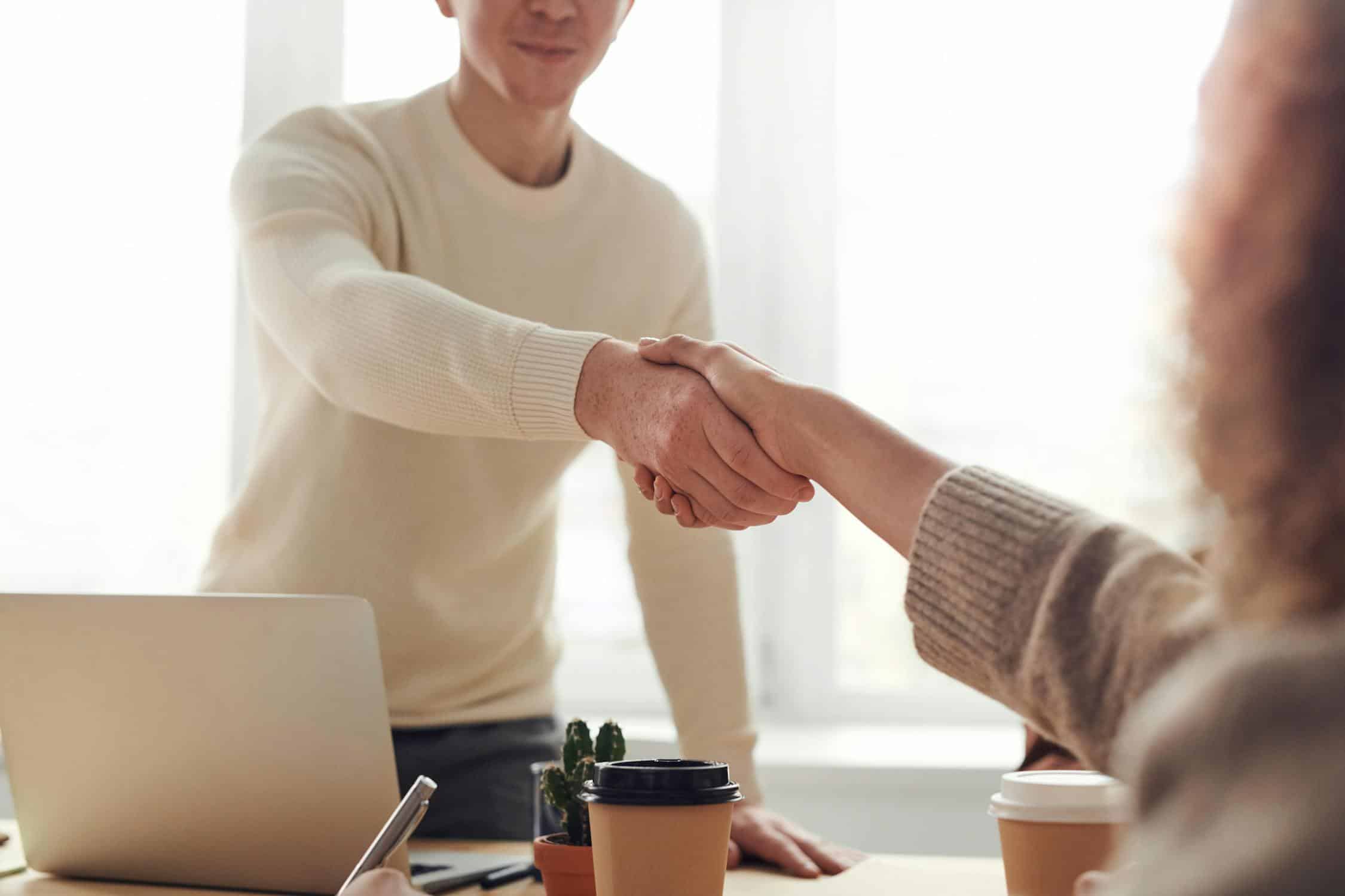 Fashion brand hiring team reviewing job descriptions