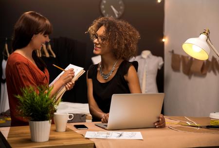 Benefits of Working with a Fashion Recruiter 4 fashion designers collaborating