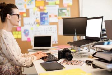 photographer working on computer