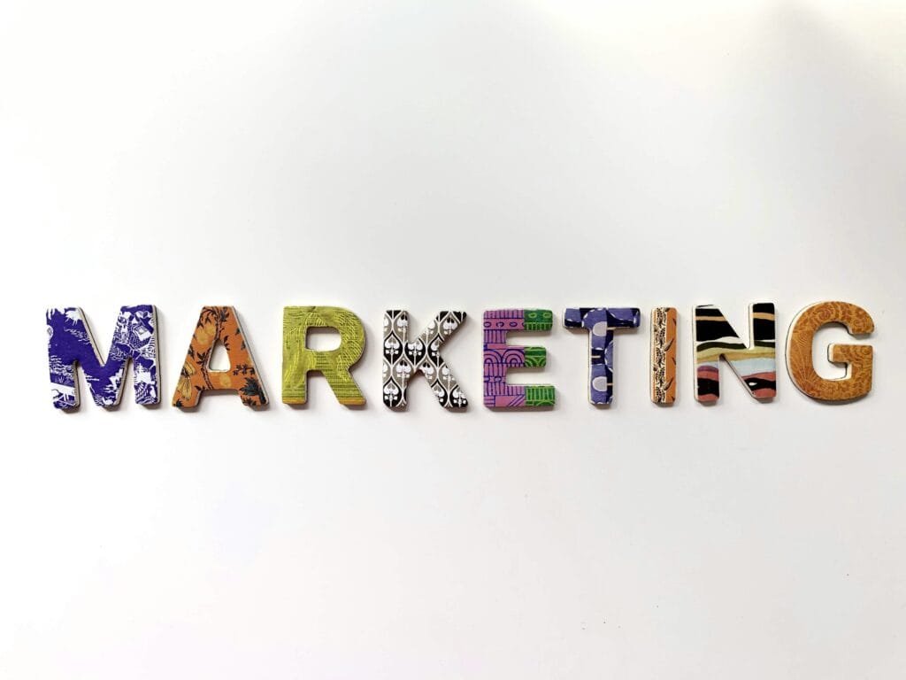 marketing concept background featuring the word ‘Marketing’ in bold text, symbolizing executive recruitment for CMO